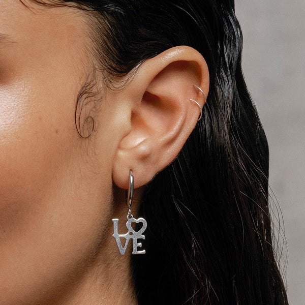 Love hot sale word earrings