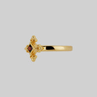 gold medieval fleur-de-lis garnet ring