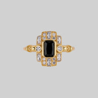 gold cocktail ring black spinel gemstone detailed skulls