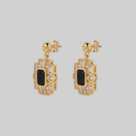 skull black spinel statement gold earrings