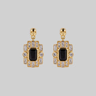 skull black spinel statement gold earrings