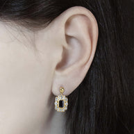 skull black spinel statement gold earrings