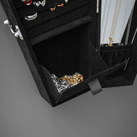 open black velvet coffin cabinet open door