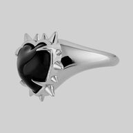 silver ring with black heart and spikes