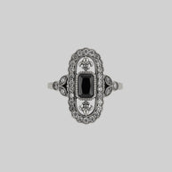 CZ statement ring with black onyx and fleur de lis